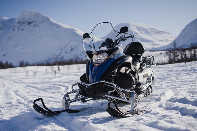 Adventure Snowmobile Safari - Riding through snow, mountains, and frozen waterways