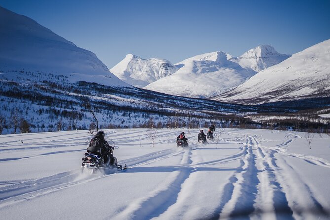 Adventure Snowmobile Safari - A warm meal inside a Sámi lavvu