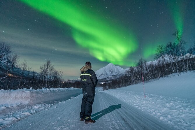 Aurora Hunt with the campfire and professional photographer - Thermal suits help, but bring your own winter gear