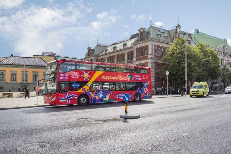 Bergen: City Sightseeing Hop-On Hop-Off Bus Tour - Stop 3: Fish Market, tourist information, and fjord cruises