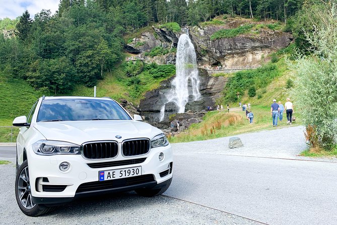 Bergen to Hardangerfjord VIP car + private yacht Fjord cruise - Steinsdalsfossen lets you walk behind the water