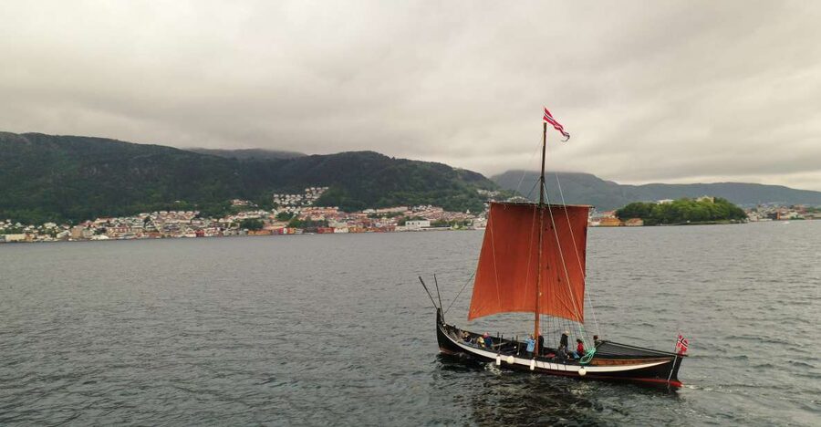 Bergen: Viking Ship Sailing Experience and Sightseeing Trip - A Viking-style boat beside Bryggen