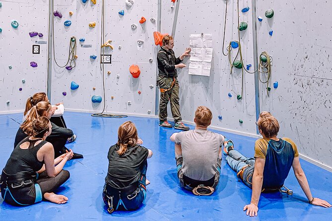 Climbing in Mørkvedhallen Klatresenter - Getting fitted with a harness and climbing shoes