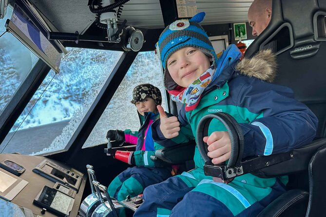 Fjord Safari in the Altafjord - A warm boat matters in Alta