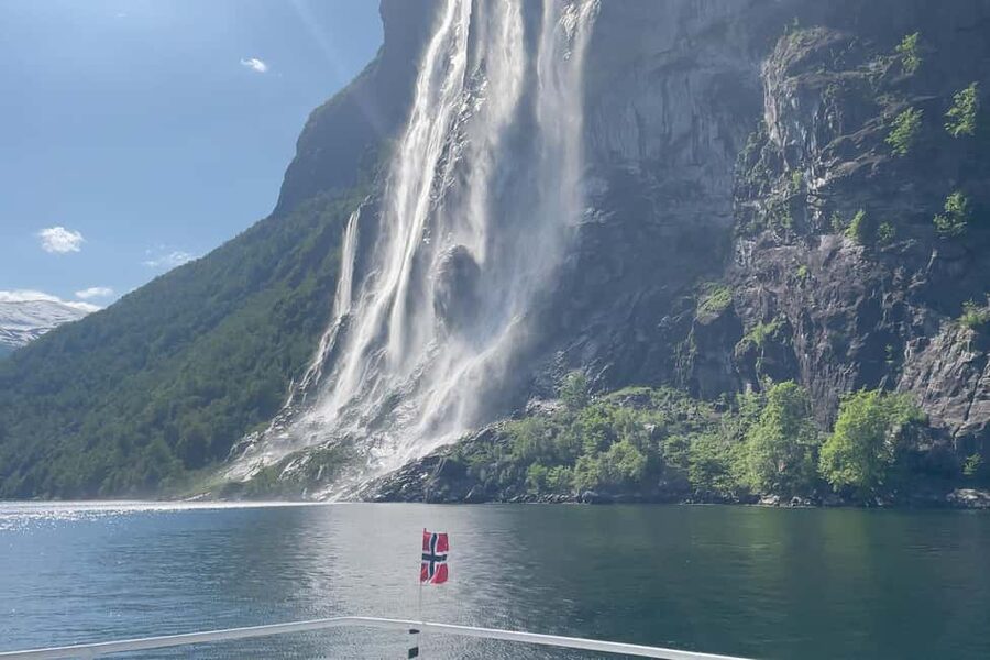 From Geiranger: Geiranger Fjord Tour with Stop in Hellesylt - The Friaren waterfall water tasting