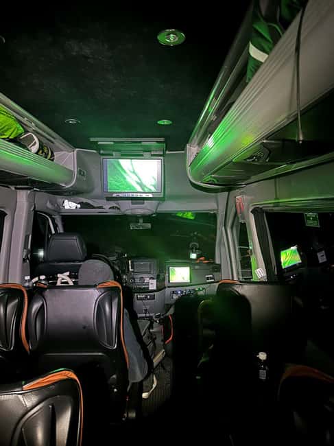 From Tromsø: Aurora Minibus Chase with Portrait and Hot Meal - Campfire food turns waiting into part of the evening