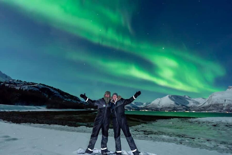 From Tromsø: Aurora Minibus Chase with Portrait and Hot Meal - Meeting at Ami Hotel and preparing for the cold