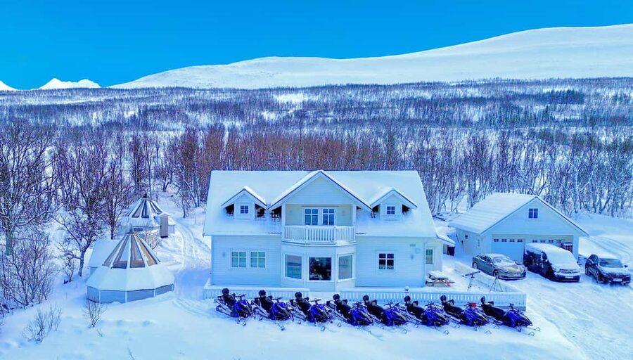 From Tromsø: Lyngen Alps Guided Snowmobile Tour - Fjords, forests, and photo stops