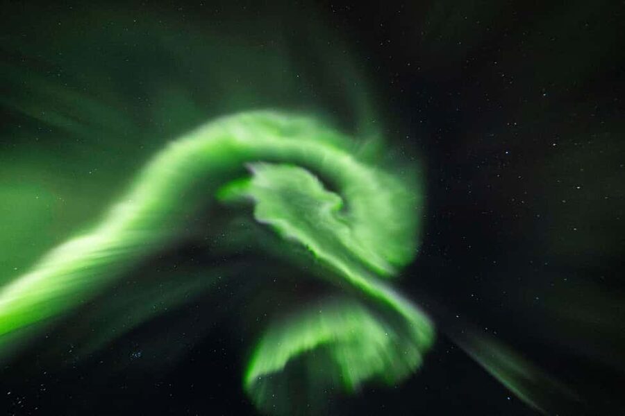 From Tromsø: Northern Lights Visit at Camp Tamok - Fire, stew, and the Sámi lávvu