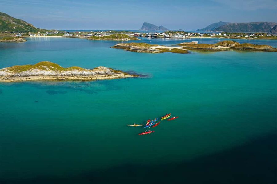 From Tromsø: Sea Kayaking Tour at Sommarøy with Transfer - Getting suited up for cold Norwegian water
