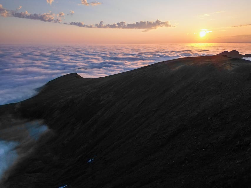 Lofoten Islands: Guided Hiking Into the Wilderness - Uphill - The summit, the photo stop, and the changing weather
