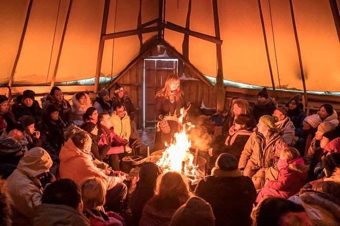 Night Reindeer Sledding with Camp Dinner and Chance of Northern Lights - Dinner inside the candlelit gamme