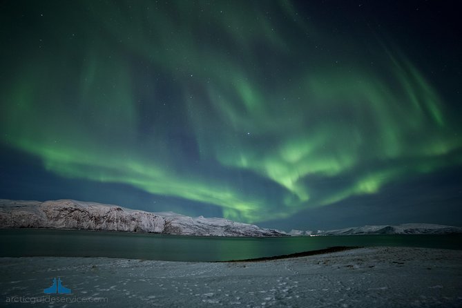 - Northern Lights Chase with Photo Package Included - The waiting time, hot drinks, and Arctic darkness