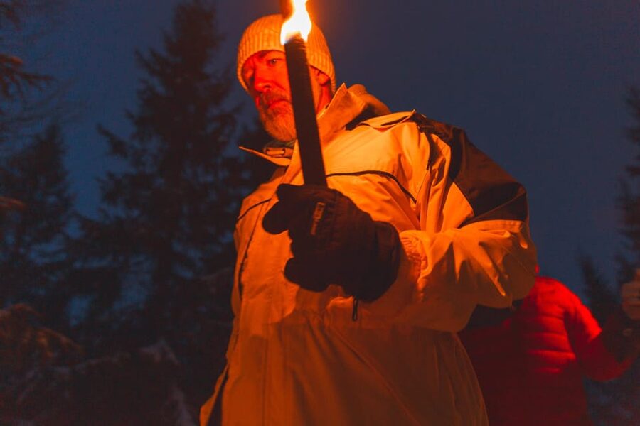 Oslo: Snowy Forest Torchlight Walk with Campfire - The campfire at frozen Øvresetertjern Lake