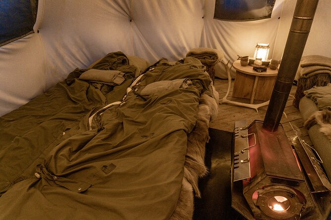 Overnight Stay with Reindeer Sledding & Feeding - Sami stories and a traditional meal inside the lavvu