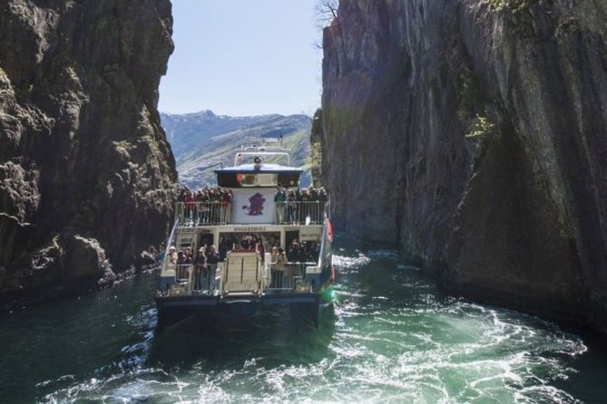 Stavanger: Waterfalls, Caves and Rock Tour By Sea - A comfortable boat, with a crowded top deck