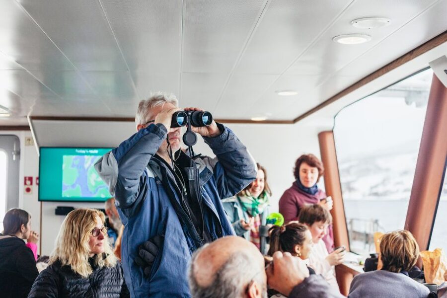 Tromsø: Arctic Fjord Cruise With Stop On Land At Fish Racks - Comfort, seating, and food onboard