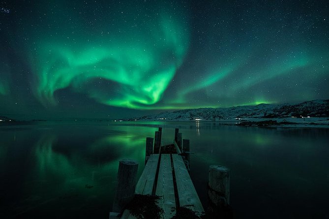 Tromso Aurora Hunt with Bonfire, Soup, Winter Gear & Transfers - Chasing clear skies beyond Tromsø