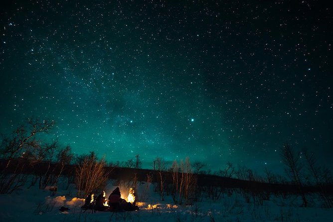 Tromso Aurora Hunt with Bonfire, Soup, Winter Gear & Transfers - The guide makes the difference