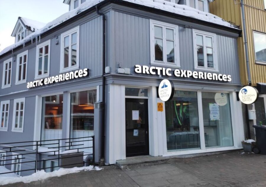 Tromso: City Highlights Guided Walking Tour - Walking the pier toward Tromsø’s Arctic past