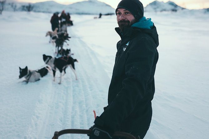 Tromso Husky Self-Drive Sledding with Cake and Drink in Lavvu - Suiting up for Arctic conditions