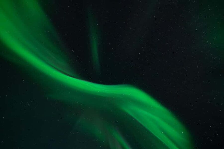 Tromsø: Northern Lights Focus Tour, German/English, minibus, meal - Following the clearest sky across Troms County