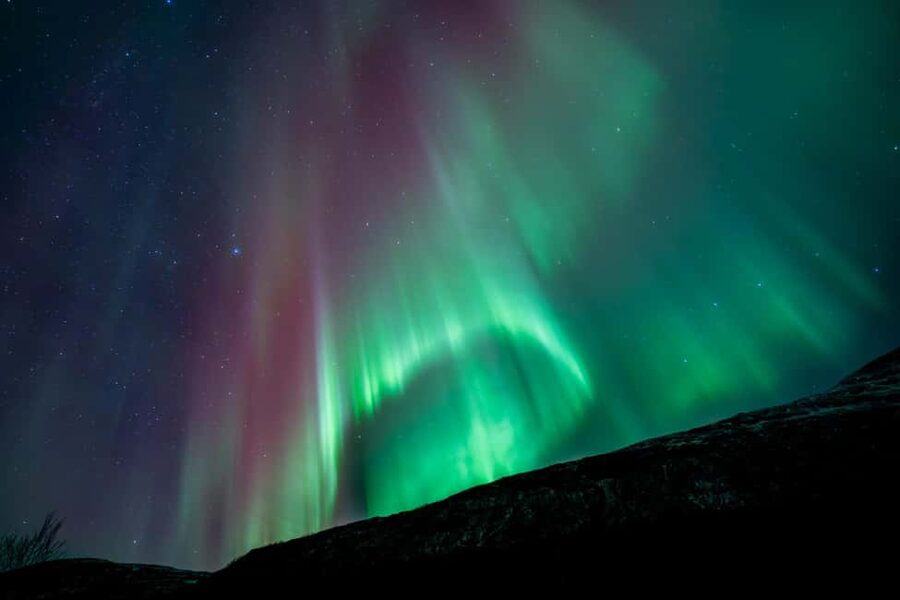 Tromsø: Northern Lights Focus Tour, German/English, minibus, meal - The guides shape the evening