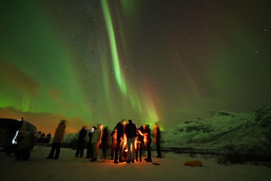 Tromsø: Northern Lights Tour with Free Professional Portrait - Returning to Tromsø after a late night