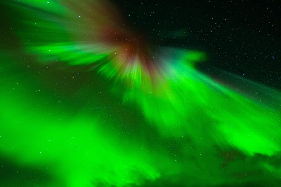 Tromsø: Small-Group Adventurous Northern Lights Hunt - Waiting beside the fire