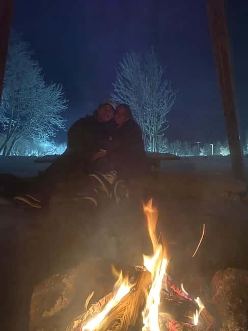 Tromsø: Snow Sledding, Mini Skiing, Lasso and Reindeer Hides - Reindeer hides, hot drinks and the fire